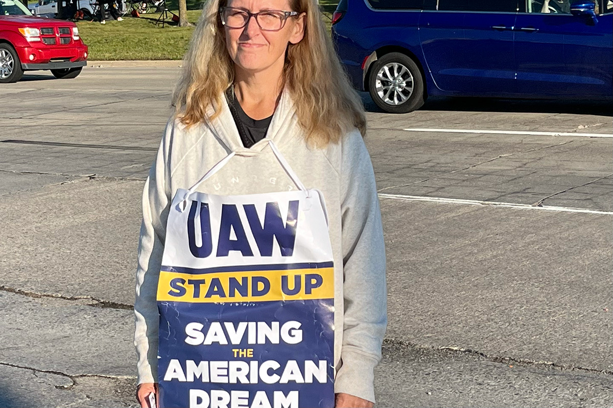 woman holding sign