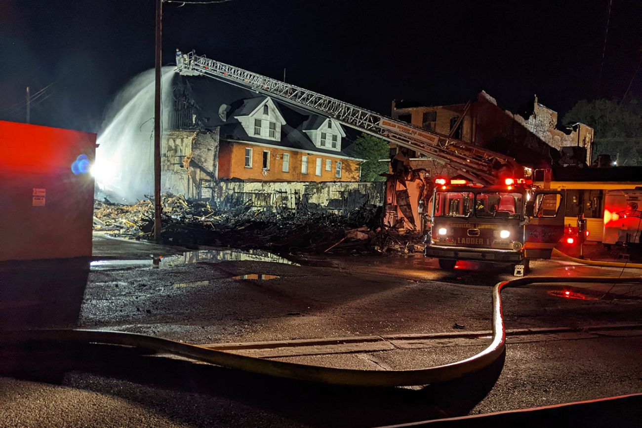 firefighter working to control fire