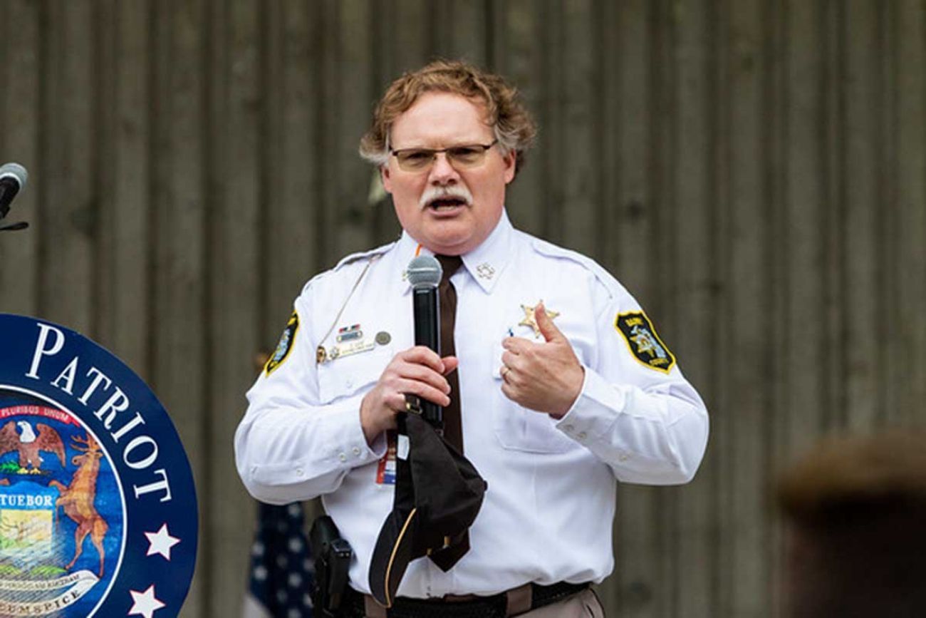Dar Leaf speaking at a rally