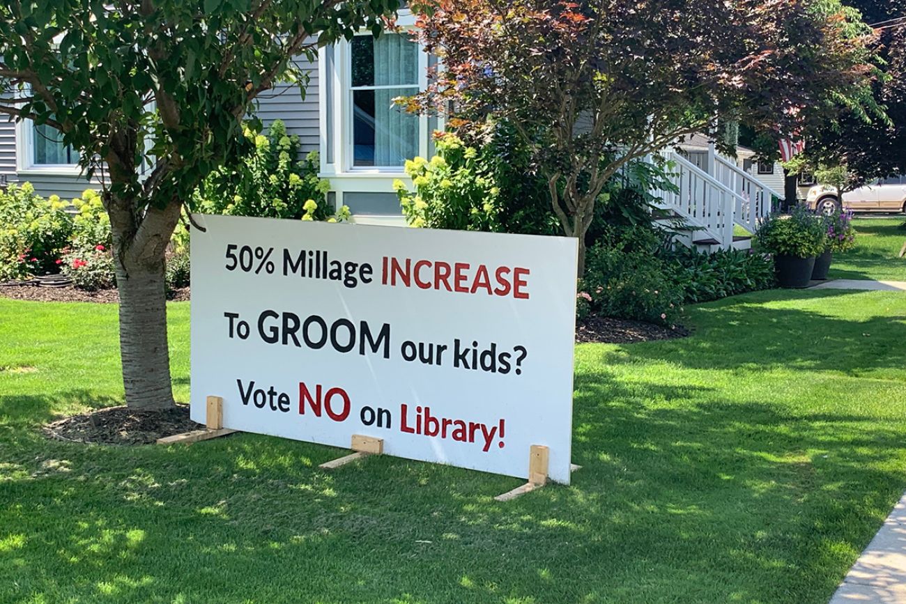 sign against library millage