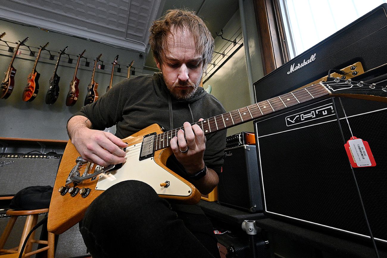man playing guitar