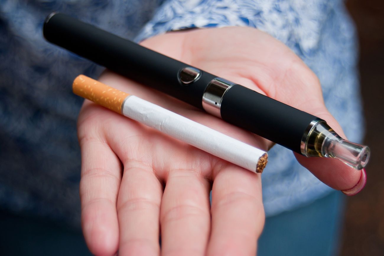closeup of hand of woman with e-cigarette