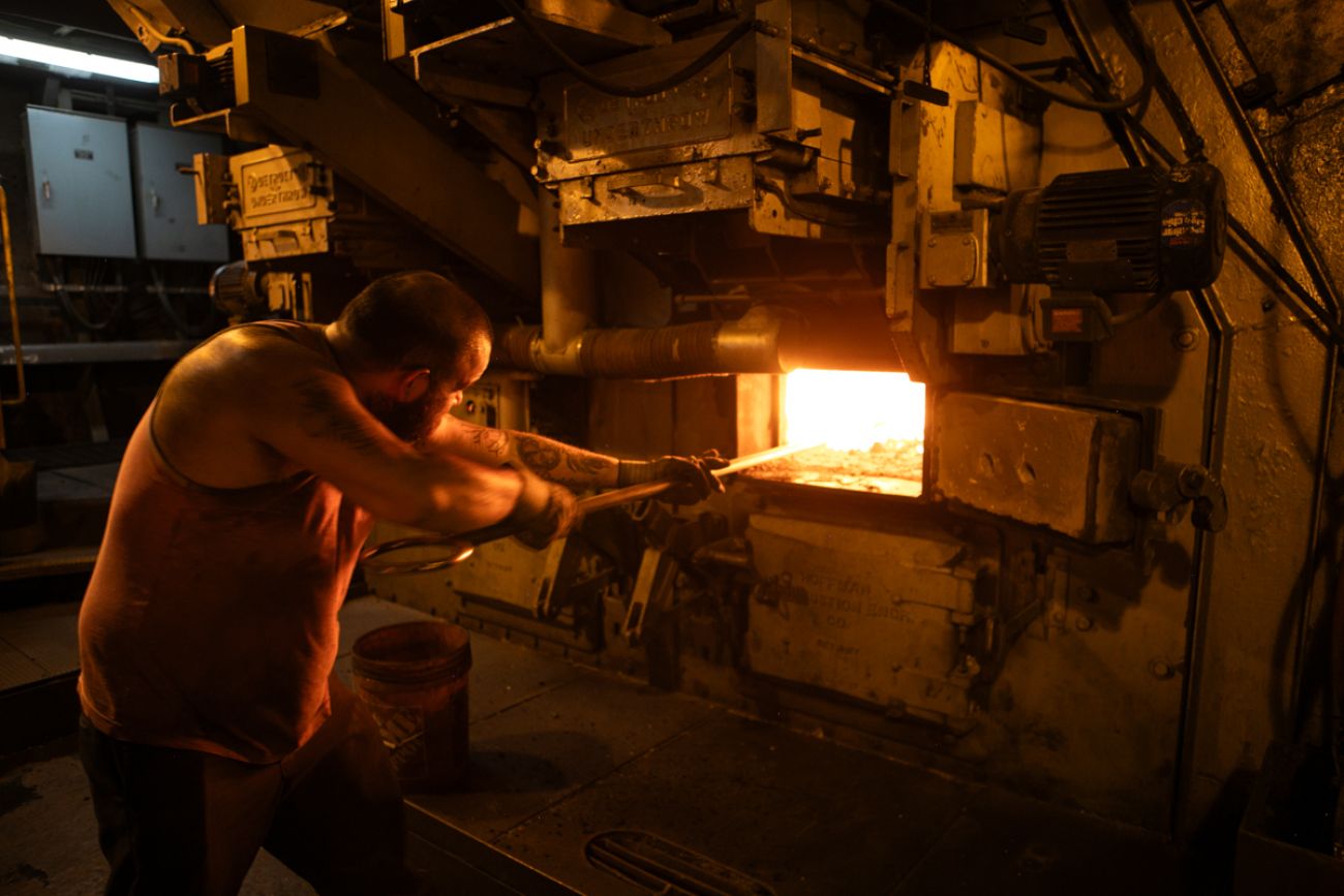 Beto Ramirez putting coal into the boilers on the SS Badger