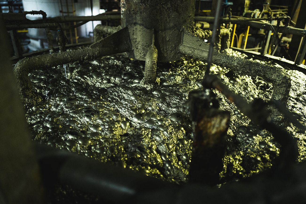 Copper and nickel form a sheen at the top of a frother in the Humboldt Mill in Michigan.
