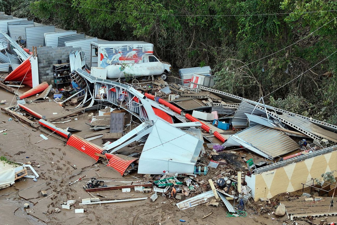 Damage from Hurricane Helene. Damaged of homes and trucks