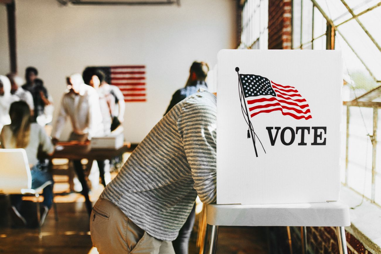A person a voting booth