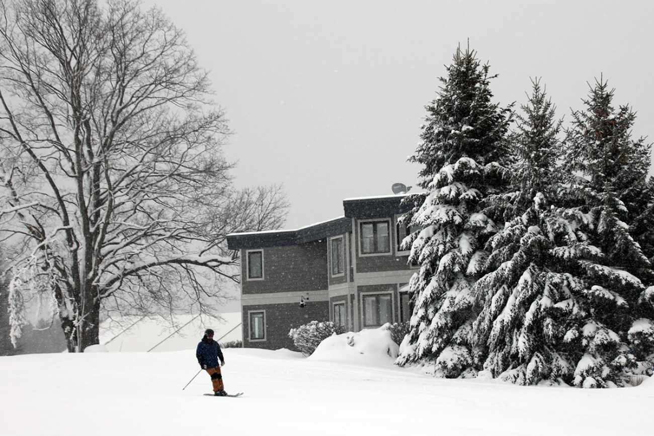 Skier on a snowy Crystal Mountain in Thompsonville, Michigan