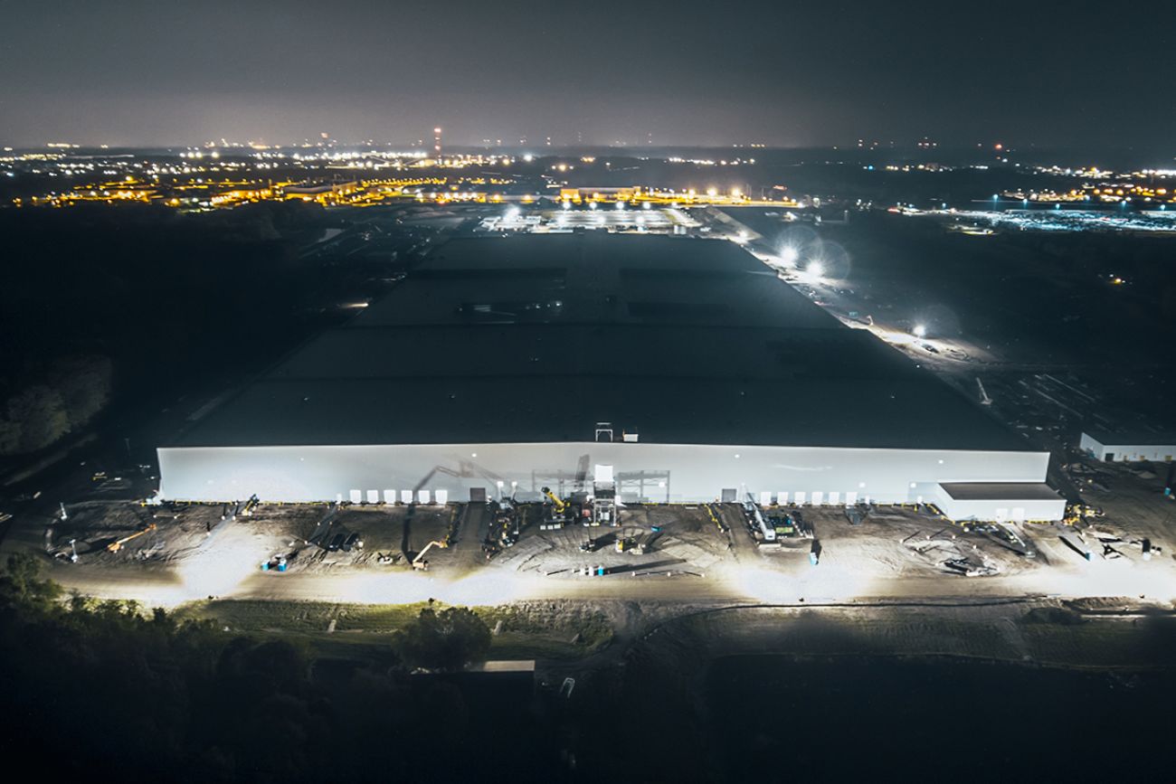 An aerial photo of the former Ultium Cells EV battery factory near Lansing, Michigan. The photo was taken at night.