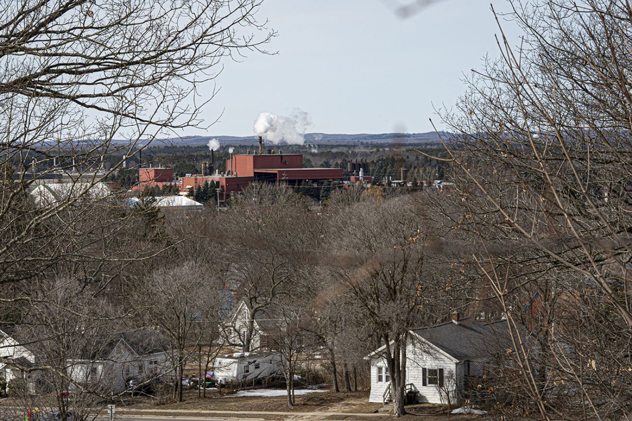 An aerial image of the Cadillac Industrial Park in Michigan. You can see a red industrial building and residental homes