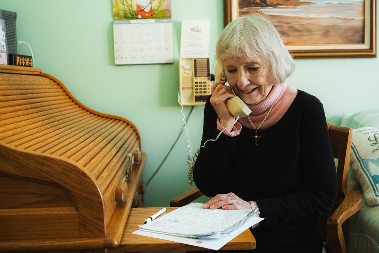 Gertie Servia talking into a phone.