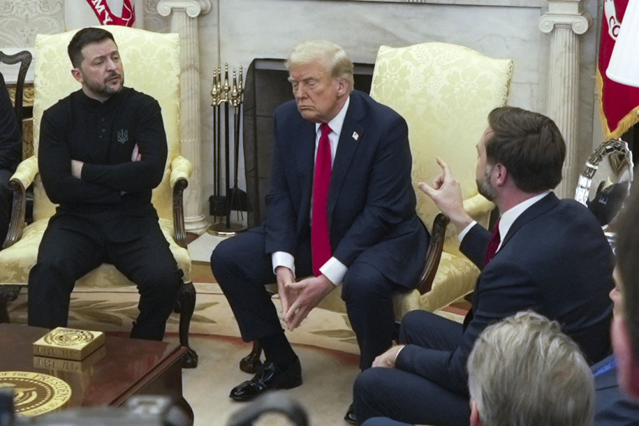 Volodymyr Zelenskyy, Donald Trump and JD Vance sitting in the Oval Office.