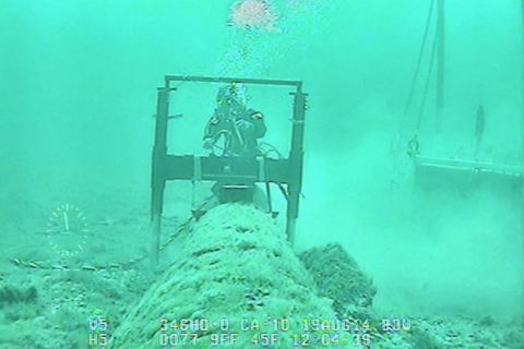 A diver next to Line 5 in the Great Lakes.