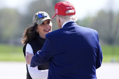 Michigan Gov. Gretchen Whitmer shakes President Donald Trump hand. 