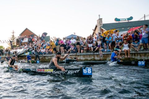 Canoers race down the Au Sable River