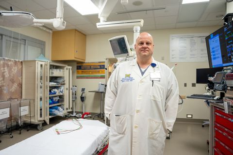 Dr. Brad J. Uren in a medical office. 