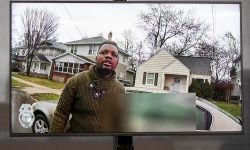 A TV display shows Patrick Lyoya in Grand Rapids, Michigan.