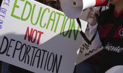 A sign that says "Education not Deportation."