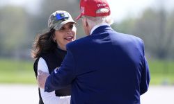 Michigan Gov. Gretchen Whitmer shakes President Donald Trump hand. 